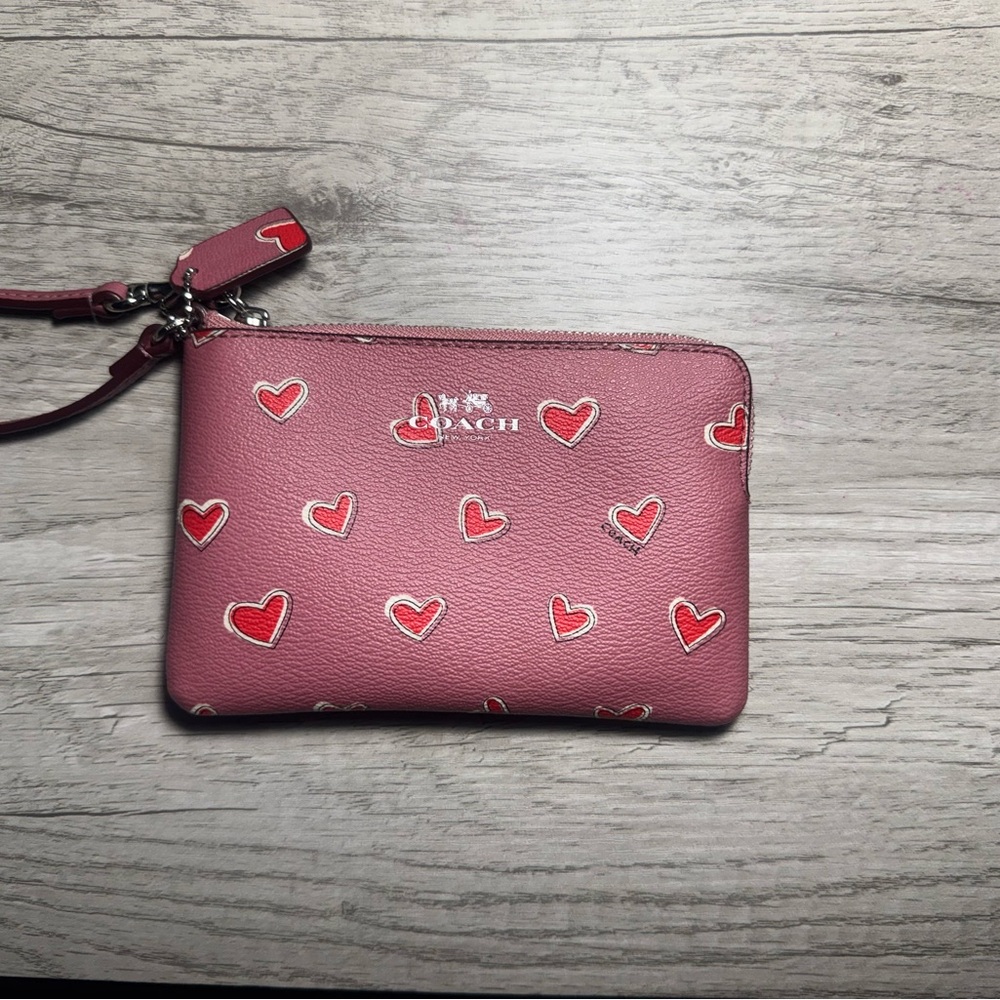 Coach Pink Wristlet with Heart Design